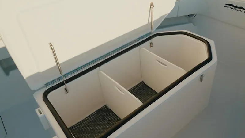 End Game Yacht Photos Pics Open storage compartment on 2020 Invincible 36 CC boat with dividers.