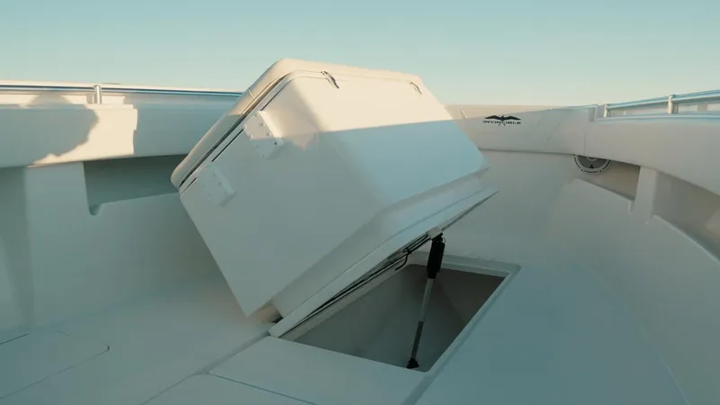 End Game Yacht Photos Pics 2020 Invincible 36 CC boat with open storage compartment on deck.
