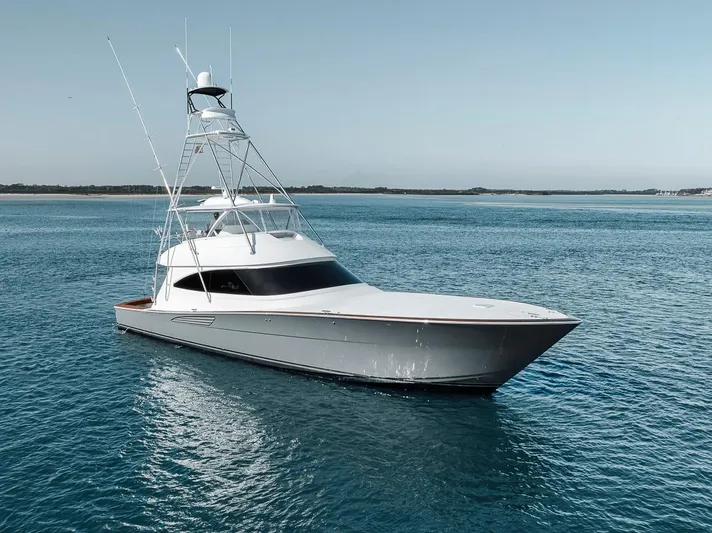 Bid Time Yacht Photos Pics 2023 Viking 72 Convertible yacht on calm blue waters.