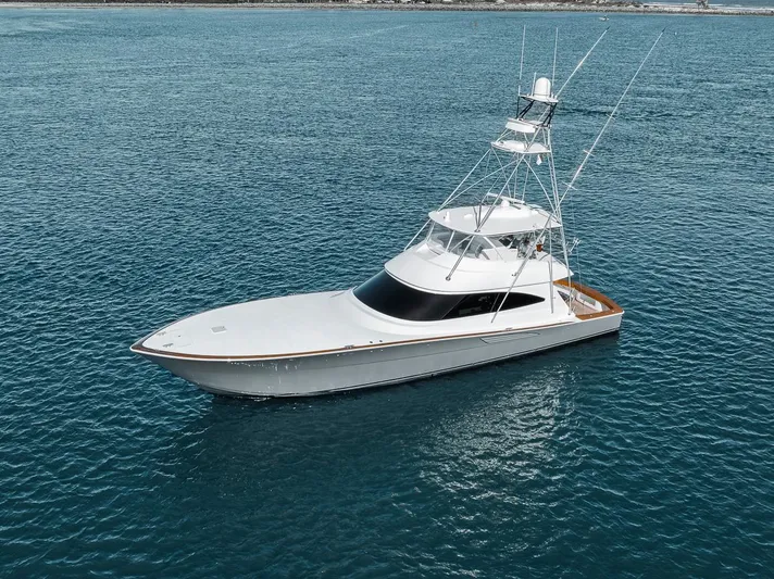 Bid Time Yacht Photos Pics 2023 Viking 72 Convertible yacht on open water.