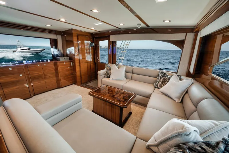 Bid Time Yacht Photos Pics Luxurious interior of 2023 Viking 72 Convertible yacht with ocean view.