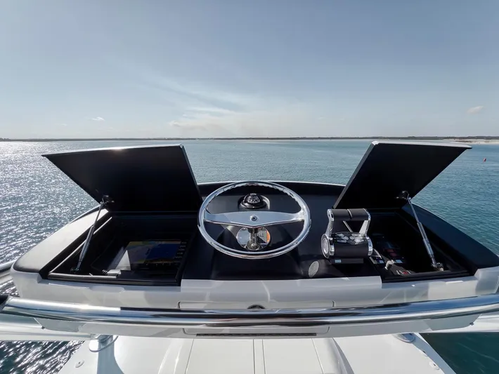 Bid Time Yacht Photos Pics 2023 Viking 72 Convertible yacht helm with ocean view.