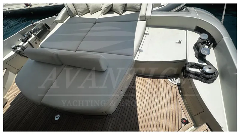  Yacht Photos Pics Luxurious 2009 Azimut 68S yacht deck with sunbed and teak flooring.