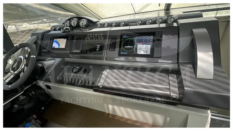  Yacht Photos Pics 2009 Azimut 68S yacht helm with advanced navigation displays and controls.