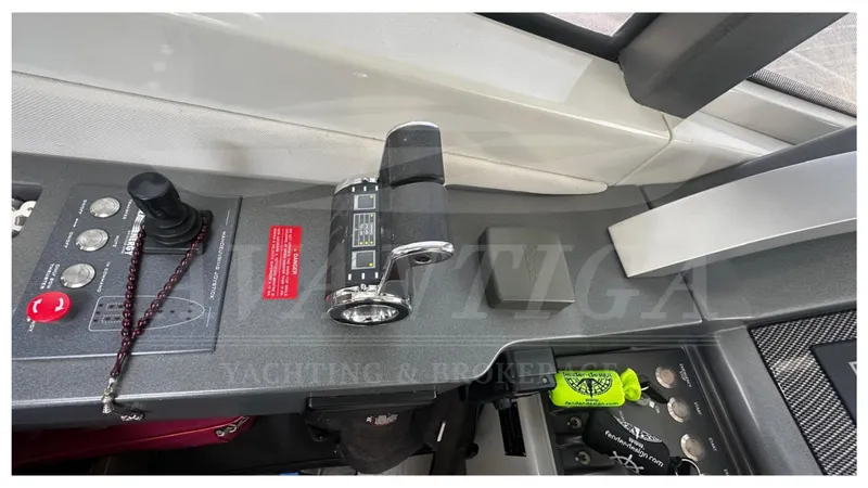  Yacht Photos Pics Control panel of a 2009 Azimut 68S yacht with throttle and joystick.