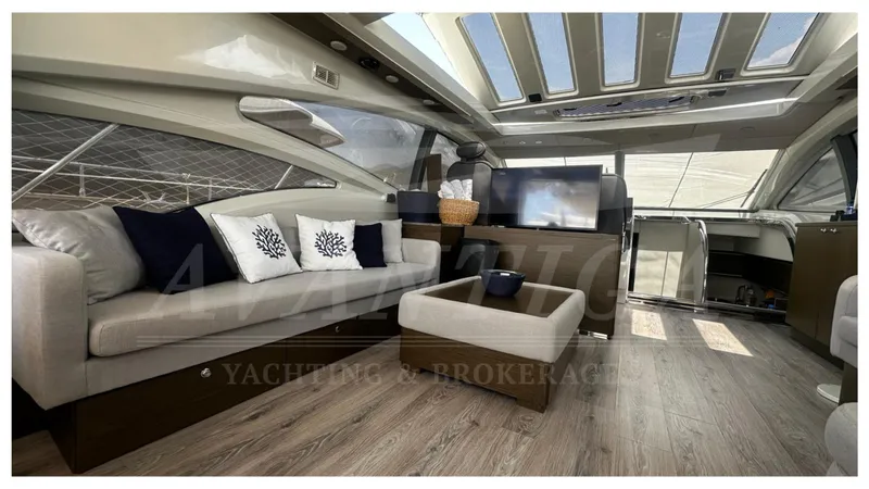  Yacht Photos Pics Luxurious interior of 2009 Azimut 68S yacht with modern furnishings and skylight.
