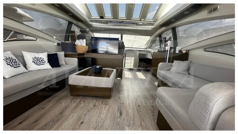  Yacht Photos Pics Luxurious interior of 2009 Azimut 68S yacht with modern seating and elegant decor.