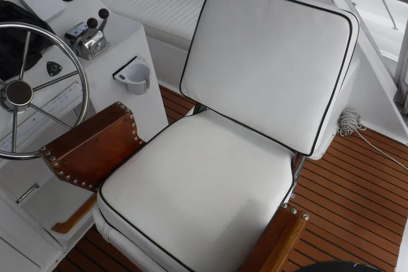  Yacht Photos Pics Captain's chair and helm on 1989 Ocean Yachts 44 Super Sport Custom boat.