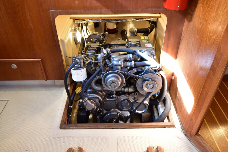 Promises Yacht Photos Pics Engine compartment of a 1998 Island Packet 350 sailboat, showcasing detailed mechanical components.