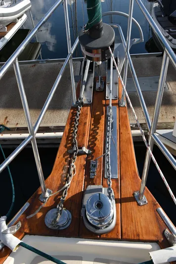 Promises Yacht Photos Pics Bow of 1998 Island Packet 350 sailboat with anchor chain and windlass.
