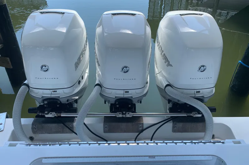  Yacht Photos Pics Triple Mercury FourStroke engines on a 2008 Invincible 36 CC boat.