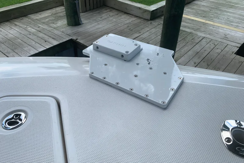  Yacht Photos Pics Invincible 36 CC 2008 boat deck with mounted Garmin bracket, dockside view.