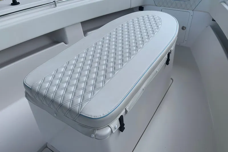  Yacht Photos Pics Padded seat on 2008 Invincible 36 CC boat, featuring diamond-stitched upholstery.