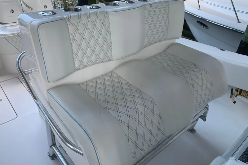  Yacht Photos Pics Luxurious seating on 2008 Invincible 36 CC boat with diamond-stitched upholstery.