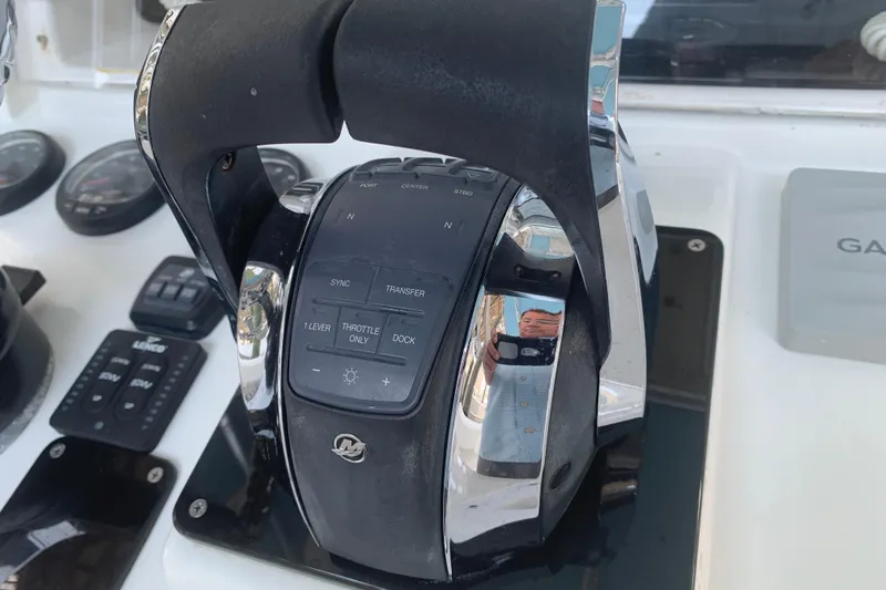  Yacht Photos Pics Close-up of Invincible 36 CC 2008 boat throttle controls and dashboard instruments.