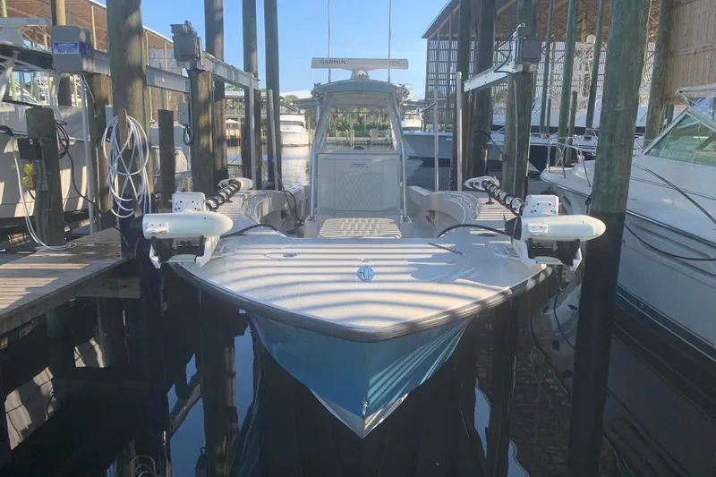  Yacht Photos Pics 2008 Invincible 36 CC boat docked, featuring advanced equipment and sleek design.