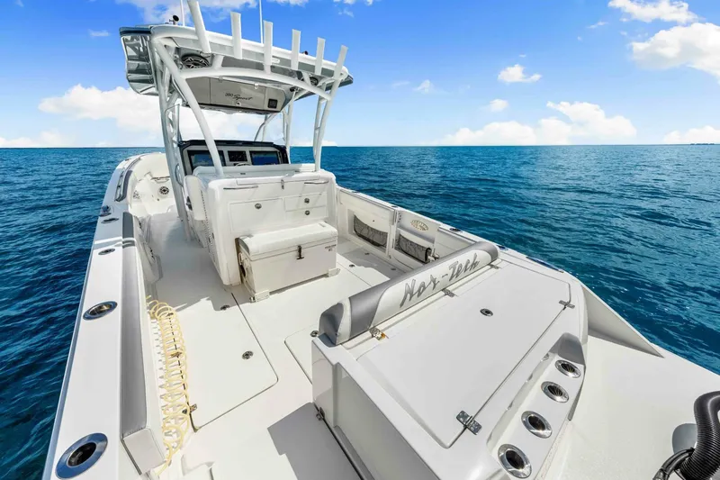  Yacht Photos Pics 2021 Nor-Tech 390 SS boat on open water, showcasing sleek design and spacious deck.