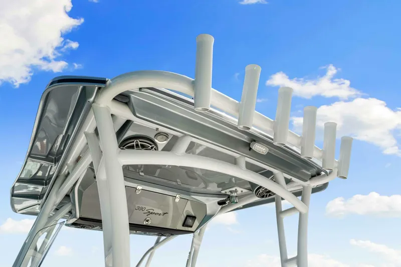  Yacht Photos Pics Nor-Tech 390 SS 2021 boat top view with rod holders against blue sky.