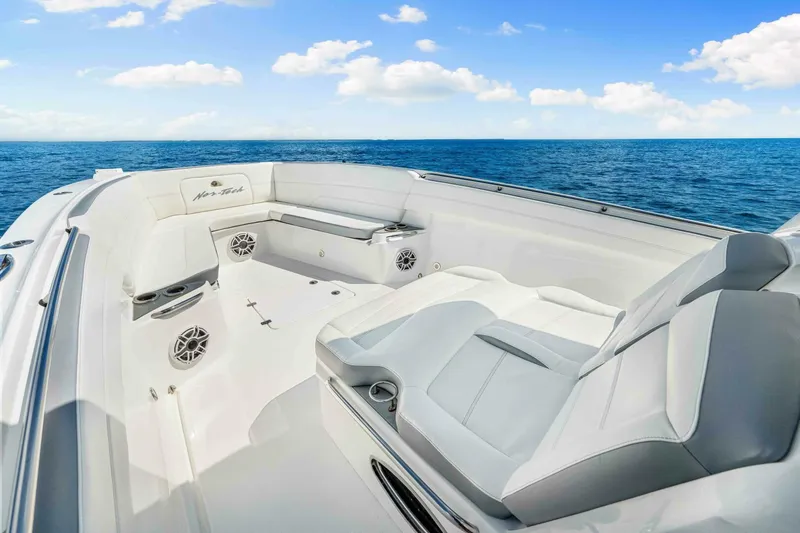  Yacht Photos Pics Luxurious 2021 Nor-Tech 390 SS boat interior with ocean view, featuring comfortable seating.
