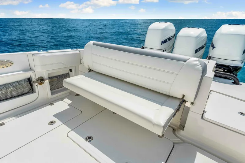  Yacht Photos Pics 2021 Nor-Tech 390 SS boat with white seating and Mercury engines on open water.