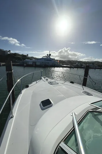Lime Of Coconut Yacht Photos Pics 2006 Rampage 38 Express yacht docked under a bright sun.