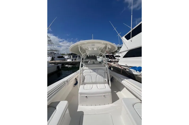 No Name Yacht Photos Pics 2016 Regulator 34 Center Console boat docked under clear blue sky.