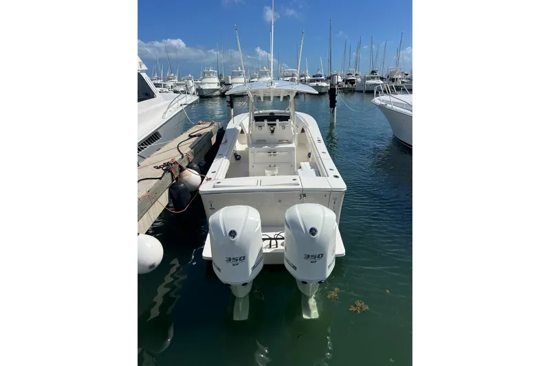 No Name Yacht Photos Pics 2016 Regulator 34 Center Console boat docked in marina with twin 350 engines.