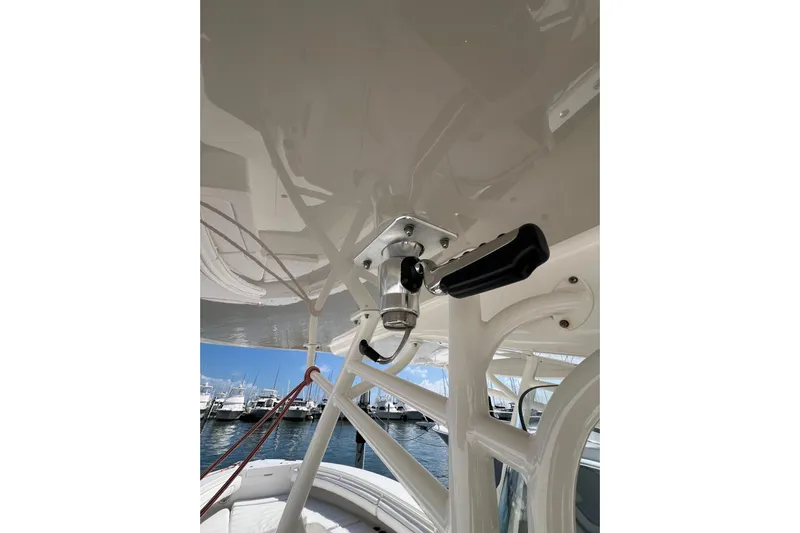 No Name Yacht Photos Pics 2016 Regulator 34 Center Console boat detail with marina background.