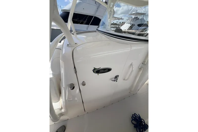 No Name Yacht Photos Pics 2016 Regulator 34 Center Console boat with sleek white design and visible logo.