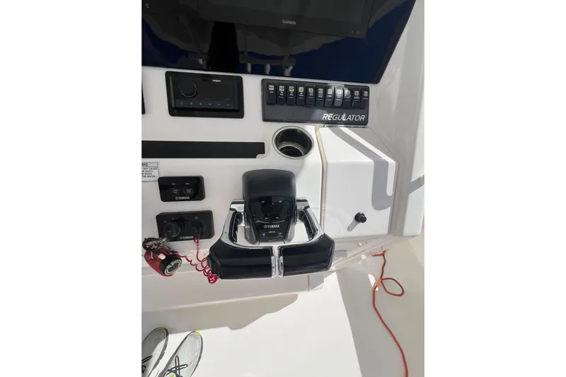 No Name Yacht Photos Pics 2016 Regulator 34 Center Console dashboard with Yamaha controls and electronic panel.