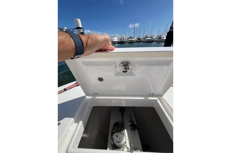 No Name Yacht Photos Pics Open storage compartment on 2016 Regulator 34 Center Console boat, docked at marina.