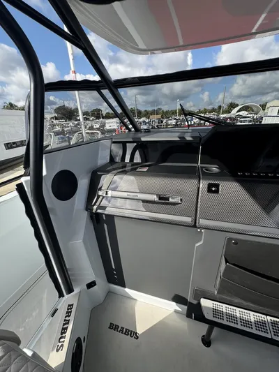 Kraken Yacht Photos Pics 2023 BRABUS Shadow 900 boat interior with sleek design and modern controls.
