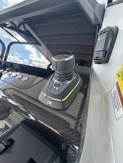 Kraken Yacht Photos Pics Control panel of 2023 BRABUS Shadow 900 boat with joystick and buttons.