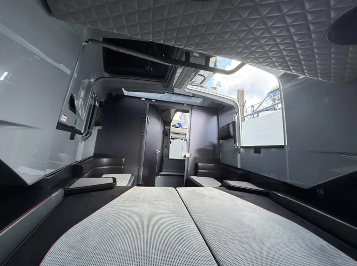 Kraken Yacht Photos Pics Interior of 2023 BRABUS Shadow 900 ST, featuring modern design and luxurious seating.