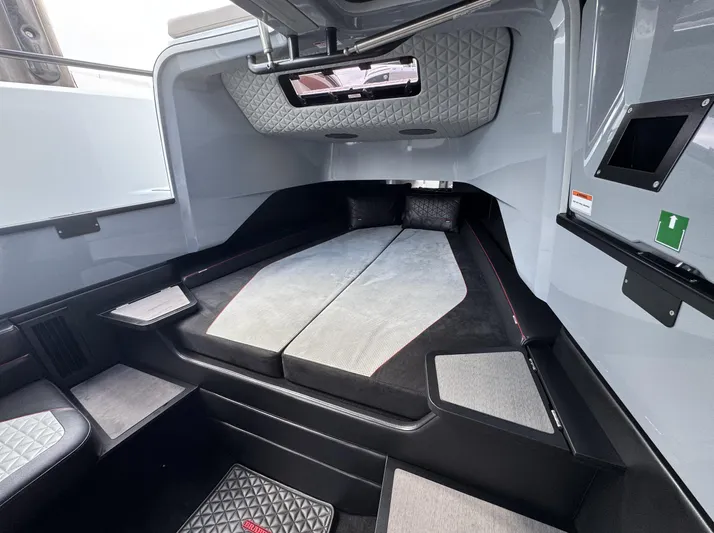 Kraken Yacht Photos Pics Interior cabin of 2023 BRABUS Shadow 900 ST, featuring modern design and comfortable seating.