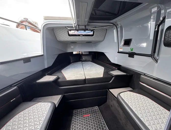 Kraken Yacht Photos Pics Interior of 2023 BRABUS Shadow 900 ST, featuring sleek, modern design and luxurious seating.