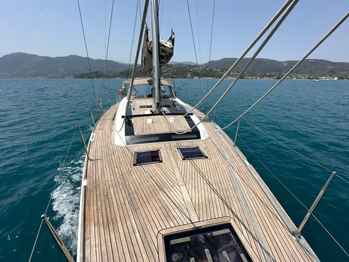 Nick Of Time III Yacht Photos Pics Beneteau Oceanis 55 yacht sailing on clear blue waters, 2015 model.