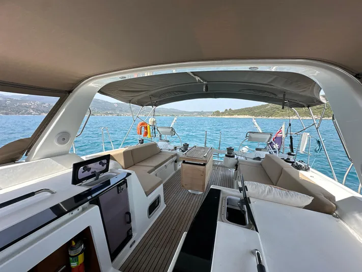 Nick Of Time III Yacht Photos Pics Spacious cockpit of 2015 Beneteau Oceanis 55 yacht with scenic ocean view.