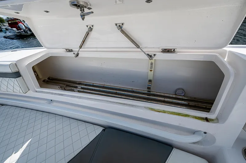  Yacht Photos Pics Open storage compartment on 2019 Intrepid 407 Nomad FE boat, showing interior space.
