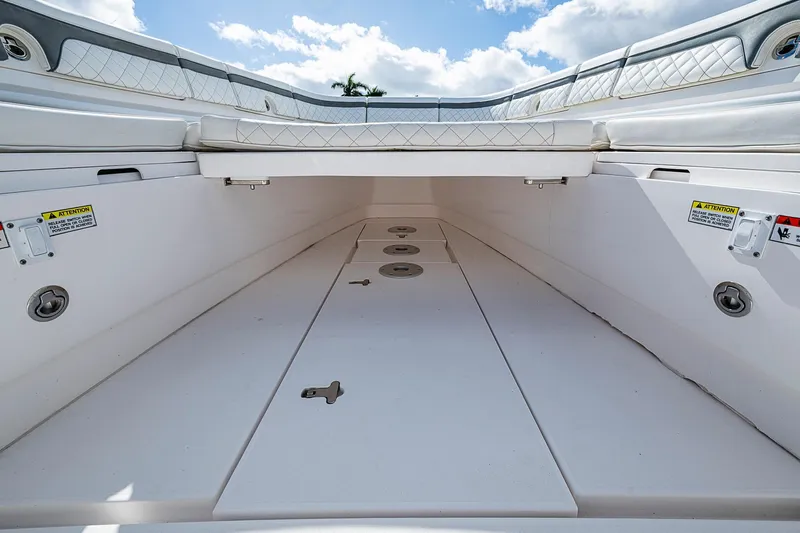  Yacht Photos Pics 2019 Intrepid 407 Nomad FE boat interior with spacious storage compartment.