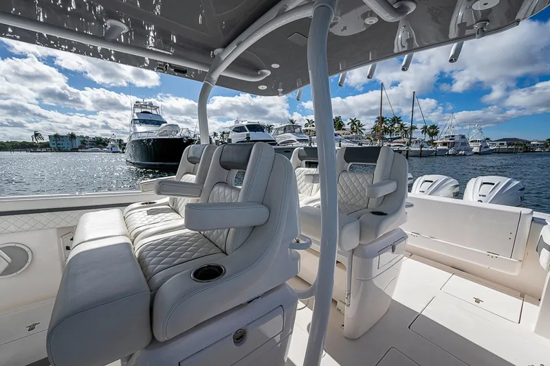  Yacht Photos Pics Luxurious interior of 2019 Intrepid 407 Nomad FE boat docked at marina.