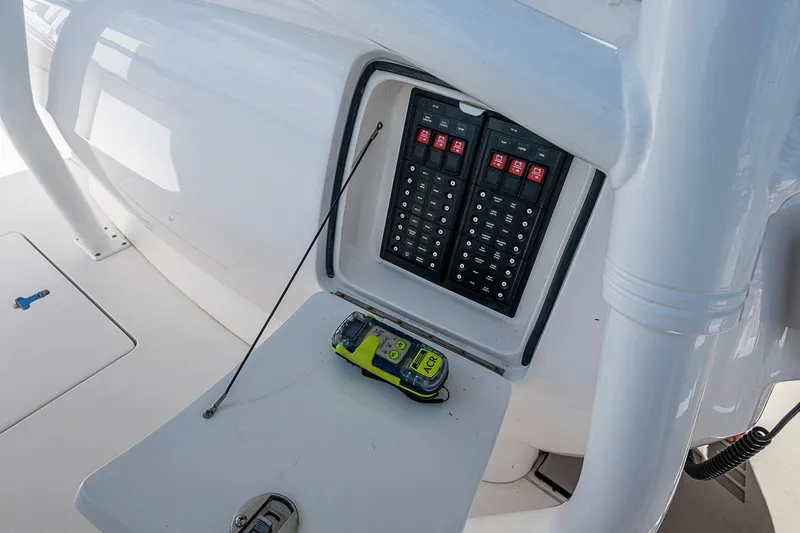  Yacht Photos Pics 2019 Intrepid 407 Nomad FE boat control panel with emergency beacon.
