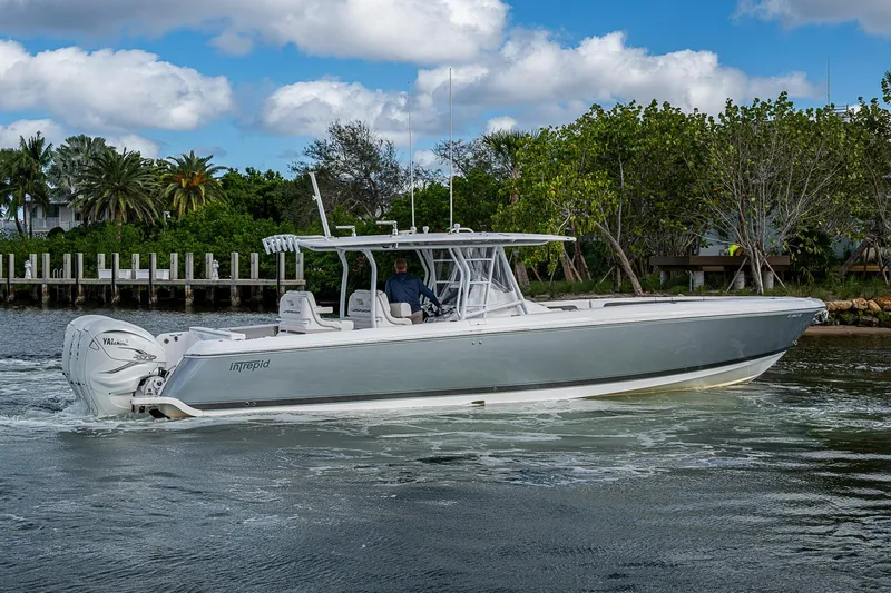  Yacht Photos Pics 2019 Intrepid 407 Nomad FE boat cruising on a scenic waterway.