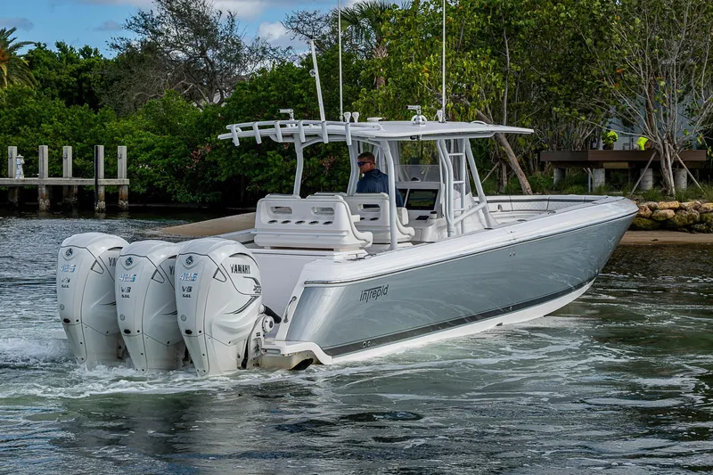  Yacht Photos Pics 2019 Intrepid 407 Nomad FE boat with triple Yamaha engines on water.