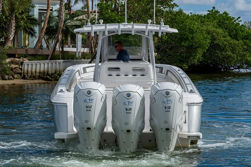  Yacht Photos Pics 2019 Intrepid 407 Nomad FE boat with triple Yamaha V8 engines on water.