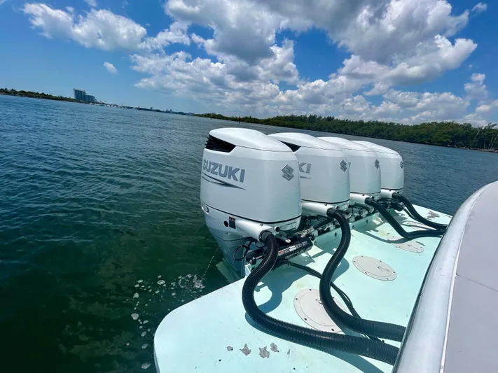 Highly Migratory Yacht Photos Pics Four Suzuki outboard motors on a 2017 Chesapeake 53 Center Console boat.