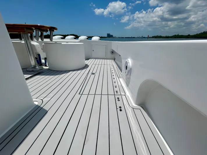 Highly Migratory Yacht Photos Pics 2017 Chesapeake 53 Center Console boat deck with sleek design and ocean view.