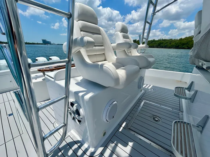 Highly Migratory Yacht Photos Pics Luxurious seating on 2017 Chesapeake 53 Center Console boat, with ocean view and clear skies.