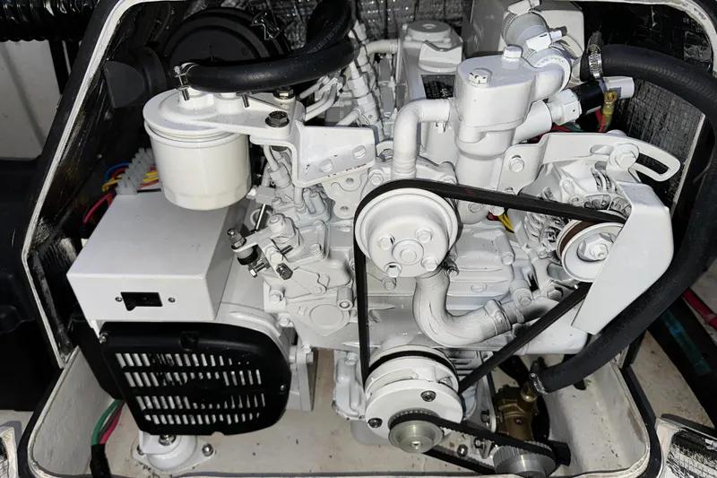  Yacht Photos Pics Engine compartment of 2000 Bayliner 5288 Pilot House Motoryacht, showcasing mechanical components.