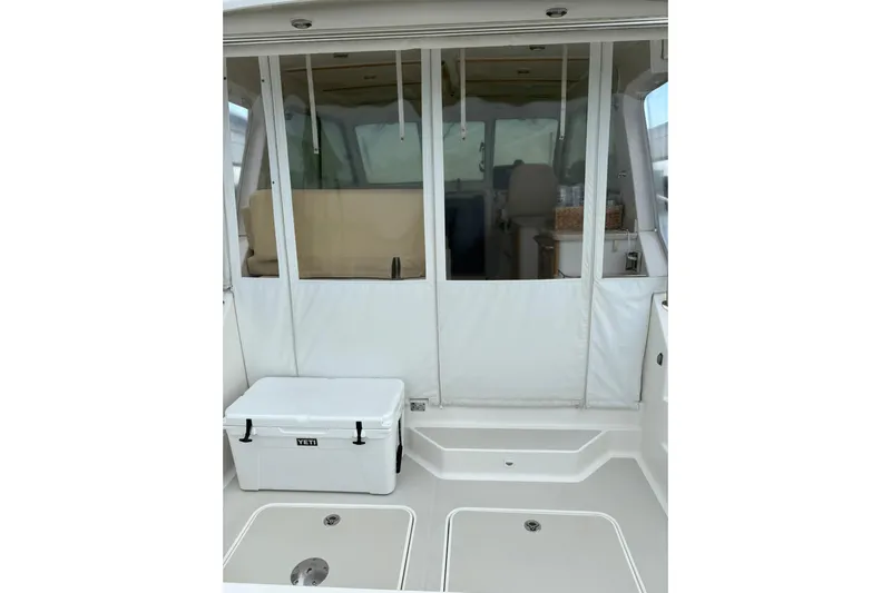  Yacht Photos Pics 2013 Back Cove 34 boat interior with Yeti cooler on deck.